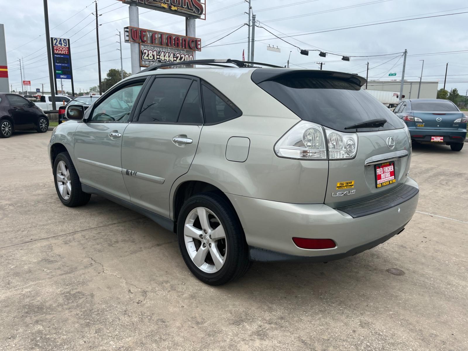 2004 SILVER /TAN Lexus RX 330 2WD (2T2GA31U44C) with an 3.3L V6 DOHC 24V engine, 5-Speed Automatic Overdrive transmission, located at 14700 Tomball Parkway 249, Houston, TX, 77086, (281) 444-2200, 29.928619, -95.504074 - Photo #4